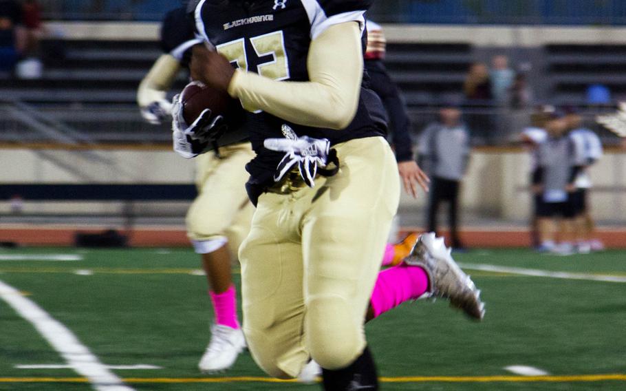 Humphreys sophmore Tyrick Arterberry breaks for a long run against the Matthew C. Perry defense at Camp Humphreys, South Korea, Friday, Oct. 13, 2017. Perry defeated Humphreys 20-10. 