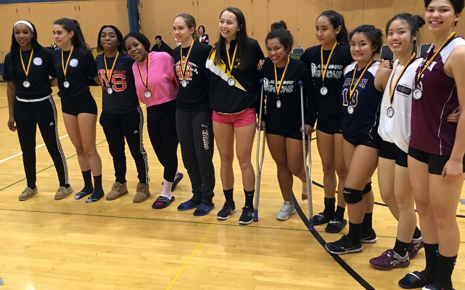 All-Tournament selections in the American School In Japan-YUJO III girls volleyball tournament: Nile C. Kinnick's Jade McGinnis, Petra Portabella of United World College of Singapore; Rhamsey Wyche of Kadena; Kyra Anderson of Yokota; Christian Academy Japan's Julia Flemming; ASIJ's Kiki Davidson; Kubasaki's McKayla Major and Mimi Larry; and Momoka Umemiya, Angela Chou and tournament MVP Amanda Wood of champion Seisen.