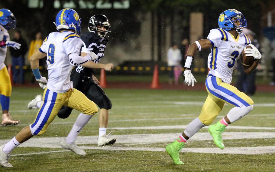 Yokota's Kishaun Kimble-Brooks leaves teammates and Zama  opponents in his wake en route to one of his three touchdowns.