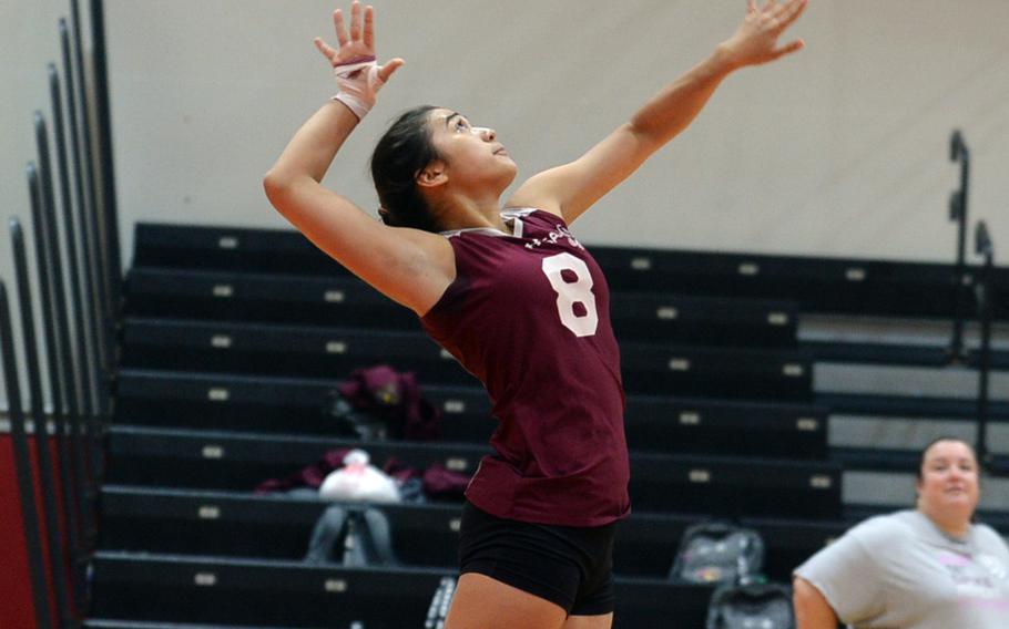 Matthew C. Perry's Hazel Bolduc jump-serves against Zama  during Friday's DODEA-Japan/Pac-East volleyball tournament knockout match, won by the Trojans 25-18, 25-23, 25-19. Zama moved on to play E.J. King in Saturday's first knockout match, needing two wins to reach the final.