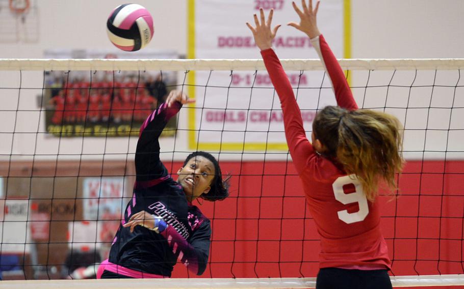 Yokota's Britney Bailey rips a spike past Nile C. Kinnick's Melissa Rose.