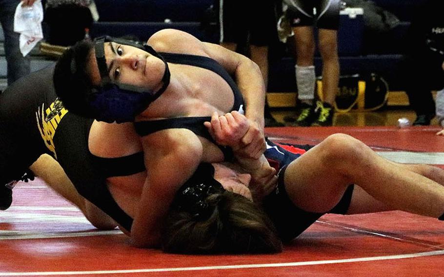 Seoul American's Steven Petracca gains the advantage on Kadena's Kaleb Wallace at 122 pounds during Thursday's early-round freestyle bout in the 41st Far East High School Wrestling Tournament. Petracca won by pin in 4 minutes, 24 seconds.