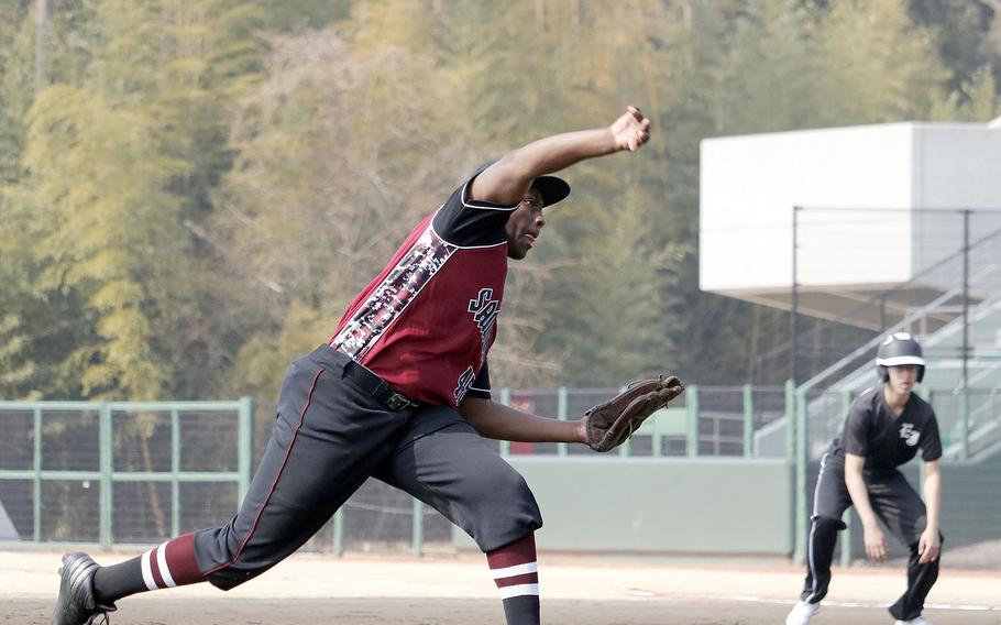 Matthew C. Perry reliever Marshall China delivers against E.J. King during Saturday's baseball game at Kizuna Stadium in Atago. The Samurai won 24-2 to sweep the weekend series from the Cobras.