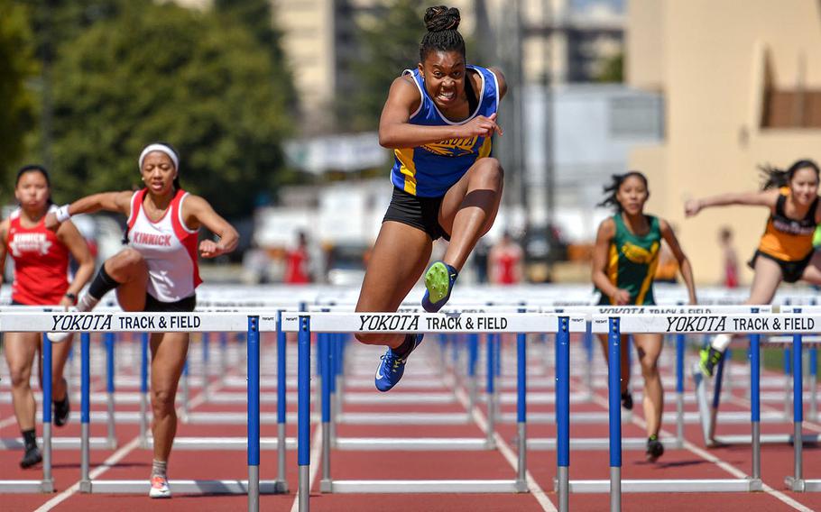 Yokota senior Britney Bailey, the defending league and Far East champion, pulls away to victory in 16.51 seconds in the 100 hurdles during Saturday's season-opening DODEA-Japan and Kanto Plain track and field meet.