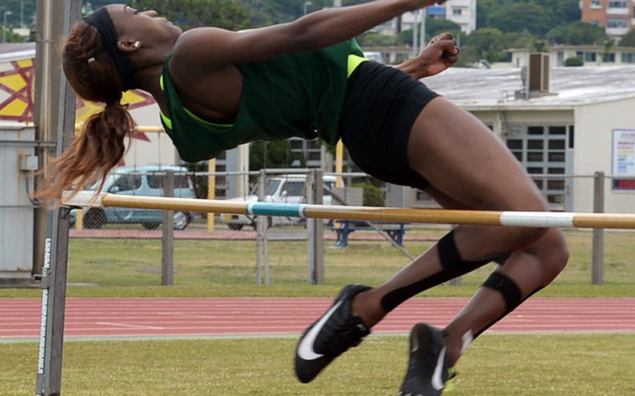 Kubasaki's Ja'Tavia Callier clears the bar at 1.55 meters during Friday's Mike Petty Memorial Track and Field Meet. She came in second in the high jump but won three other events.