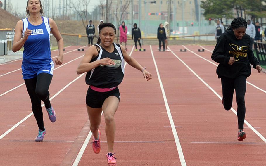 Humphreys' Taliyah Calloway leads the pack toward the finish in the girls 100 dash during Saturday's truncated Korea track and field meet at Humphreys' Blackhawks Stadium. Calloway won in 13.94 seconds on the stop watch.