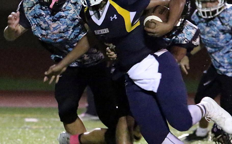 Senior RaSean Jacobs returns at rover-receiver for Guam High football.