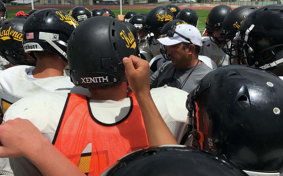 Coach Sergio Mendoza gives instructions to his charges, long on experience and skill in both the interior and at skills positions.