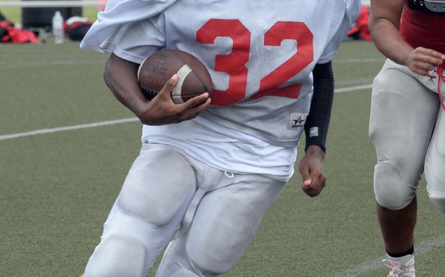 Senior Treyvion Morton, a transfer from Tennessee, is new to Nile C. Kinnick's starting backfield.