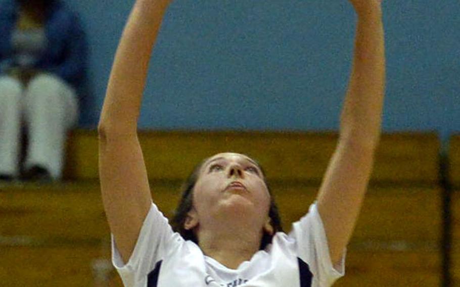 Seoul American's Lauren Kirshner sets during the Falcons' three-set win Friday over Daegu.