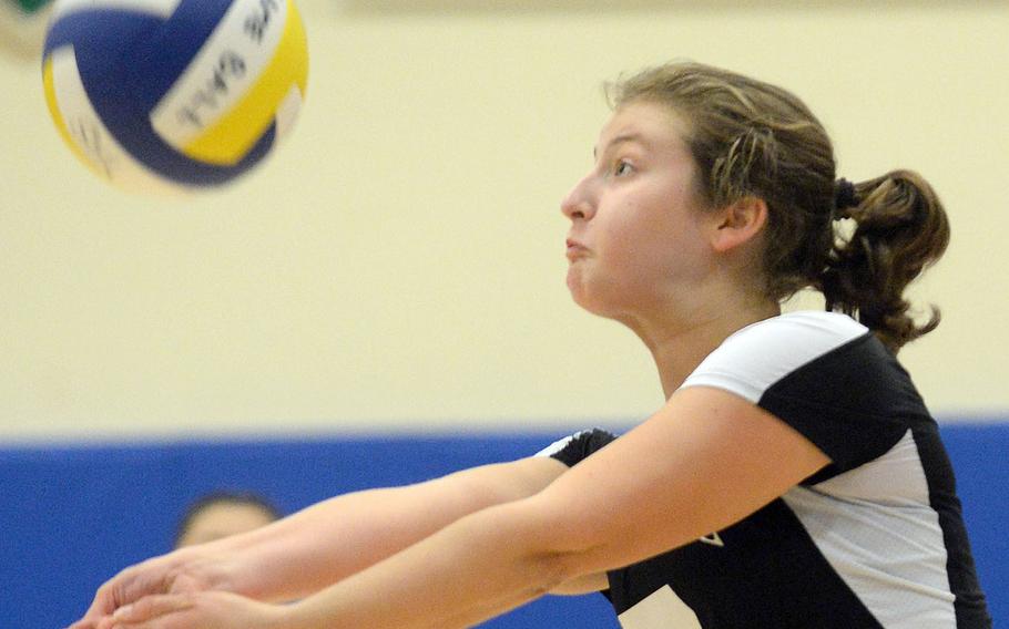Zama setter Kate Hultquist plays the ball against Yokota during Tuesday's three-set win by the Trojans over the Panthers.