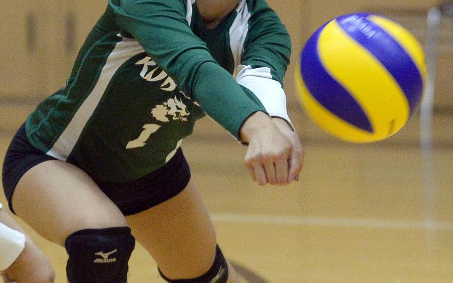 Kubasaki's Anya Andrade tries to field a Seisen spike during Saturday's Dragons' three-set win over the Phoenix for the YUJO IV tournament title.
