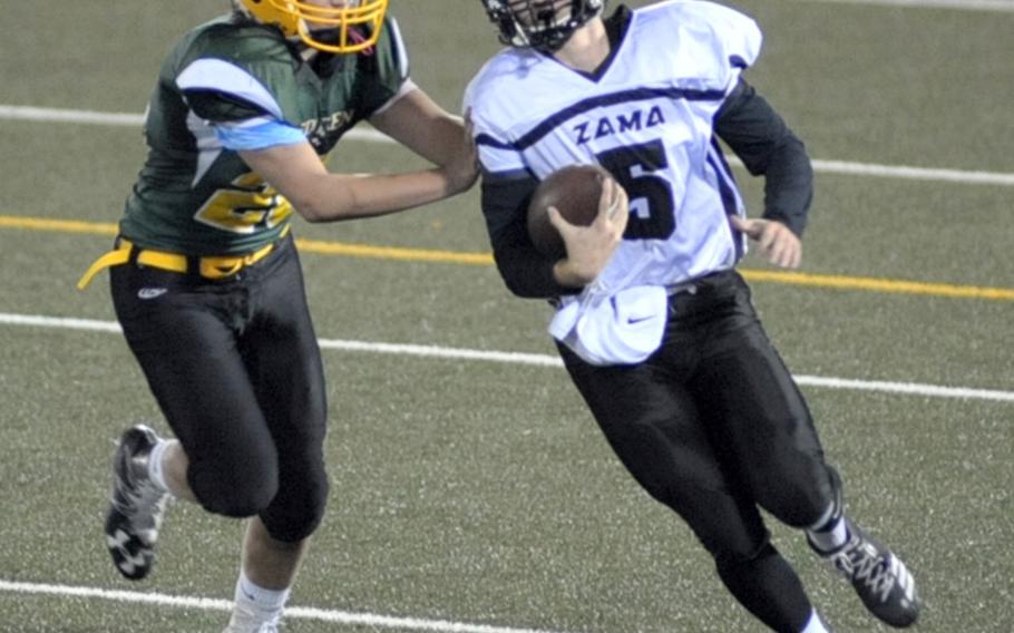 Zama quarterback Nick Cannon Canada tries to outrun Eagles defender Tyler Clarkson.