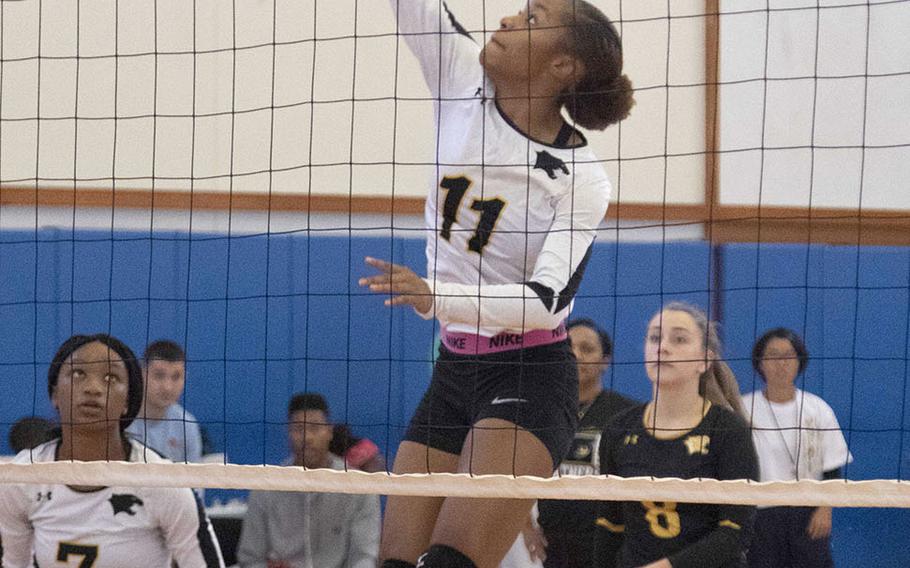 Kadena's Brie Barnett goes up to spike at the net against Urasoe Kogyo during Saturday's action in the Okinawa-American Volleyball Festa at Kadena Air Base's Risner Fitness Center. The Panthers won 25-8, 25-11.