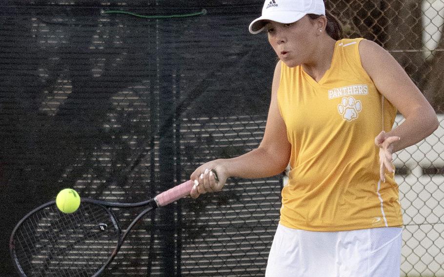 Kadena's Lisa Dombrowski smacks a forehand return during Tuesday's singles and doubles matches with Kubasaki. Dombrowski lost her singles tie 6-2 to Ally Johnson, but teamed with Maddie Tsirlis to beat Carolina Rivera and Nancy Gutzwiller 6-3 in doubles.