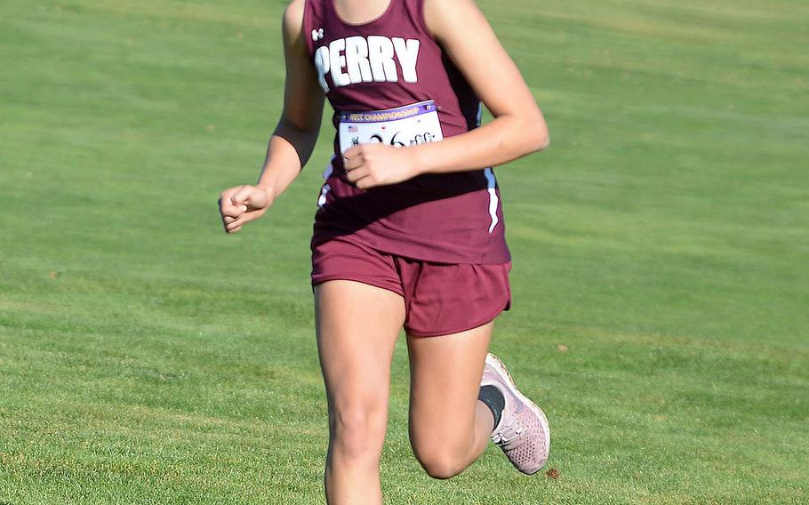 Matthew C. Perry's Angelique Armijo heads down the home stretch of Monday's Far East girls Division II race.