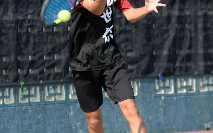 E.J. King's Takumi Kodama rips a forehand return during Wednesday's boys singles play in the Far East tennis tournament. Kodama beat Kubasaki's Kai Grubb and Matthew C. Perry's William Rudolph by 8-2 scores to reach the quarterfinals.