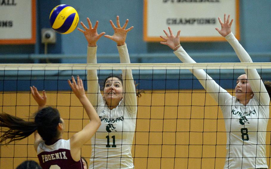 Donatella Barone, left, Abby Robinso and Kubasaki hope to rise to the top of the heap in the Far East Division I girls volleyball tournament for the fourth time in five years.