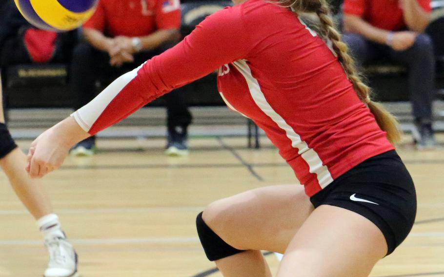 Kinnick defender Kaili Reynolds bumps the ball during Friday's elimination match in the Far East Division I girls volleyball tournament. The Red Devils swept Kadena in three sets.