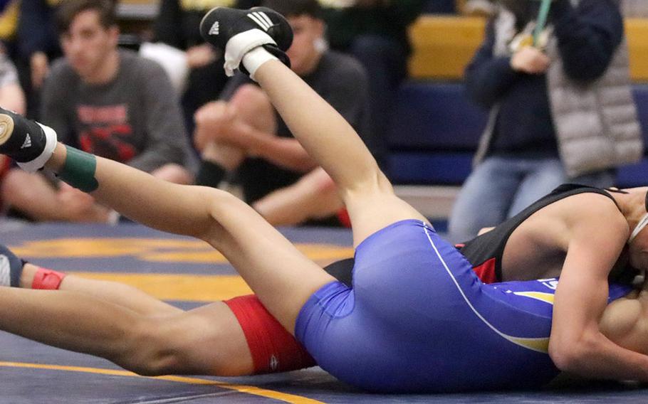 Nile C. Kinnick's Alexi Mutoh tries to finish off St. Mary's Mikhail Titov in the 101-pound final of Saturday's Yokota Invitational Wrestling Tournament. Mutoh pinned Titov in 5 minutes, 56 seconds.