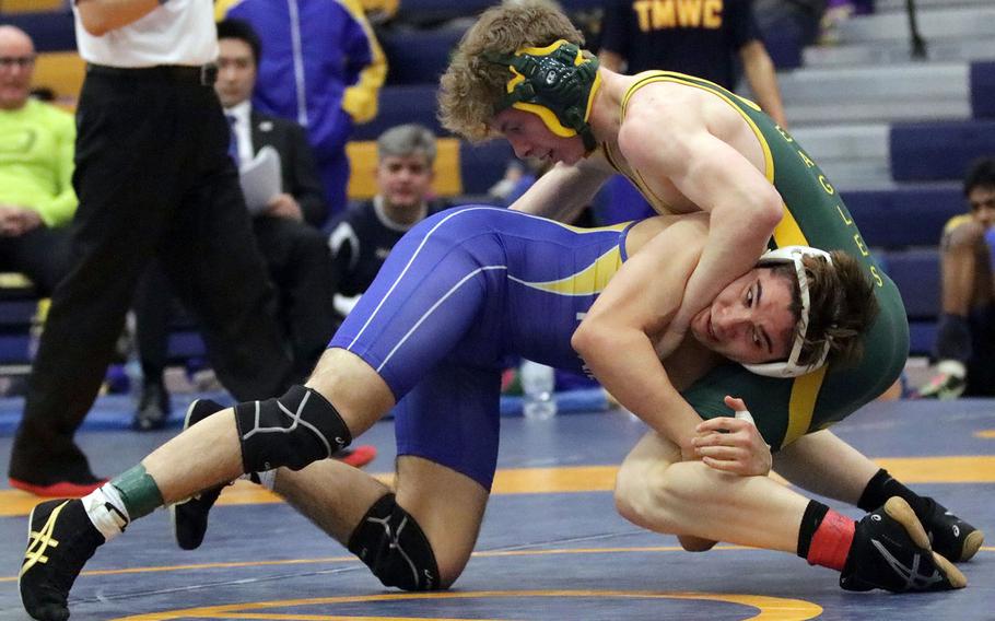 St. Mary's Cole Lawlor gains the edge on Robert D. Edgren's Ethan Hovenkotter in the 148-pound final bout of Saturday's Yokota Invitational Wrestling Tournament. Lawlor won by technical fall 10-0 in 2 minutes, 6 seconds.