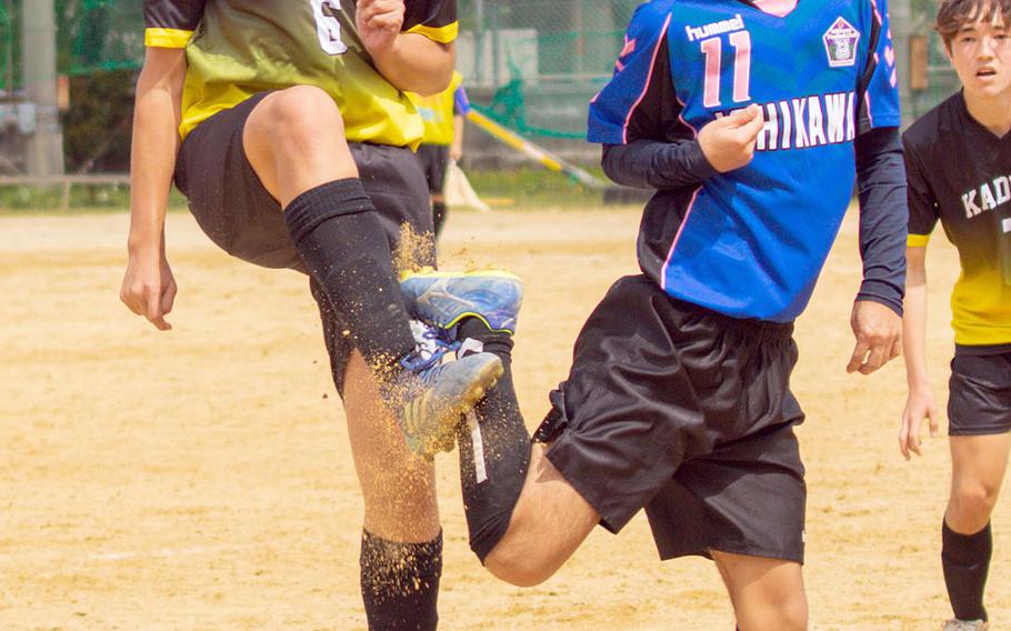 Kadena's Dakota Summers tries to settle the ball against Ishikawa during Saturday's Okinawa boys soccer match, won by the Panthers 4-2.