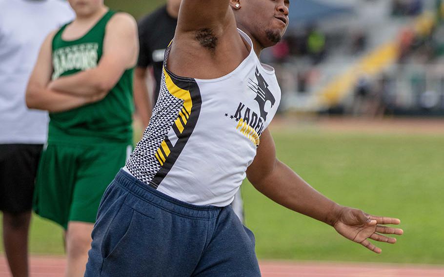 Kadena's Uriah Morris heaves the shot during Saturday's Okinawa track and field meet. Morris, a senior, won the shot put and discus in his debut as a Panther track and field athlete.