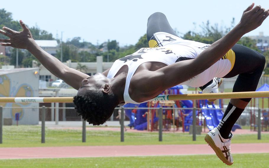 Kadena's Xavier Peace makes it over the bar in the high jump during Saturday's 15th Mike Petty Memorial Meet at Kubasaki HIgh School. Peace tied for second with Kubasaki's Tristan Higginson at 5 feet, 8 inches.