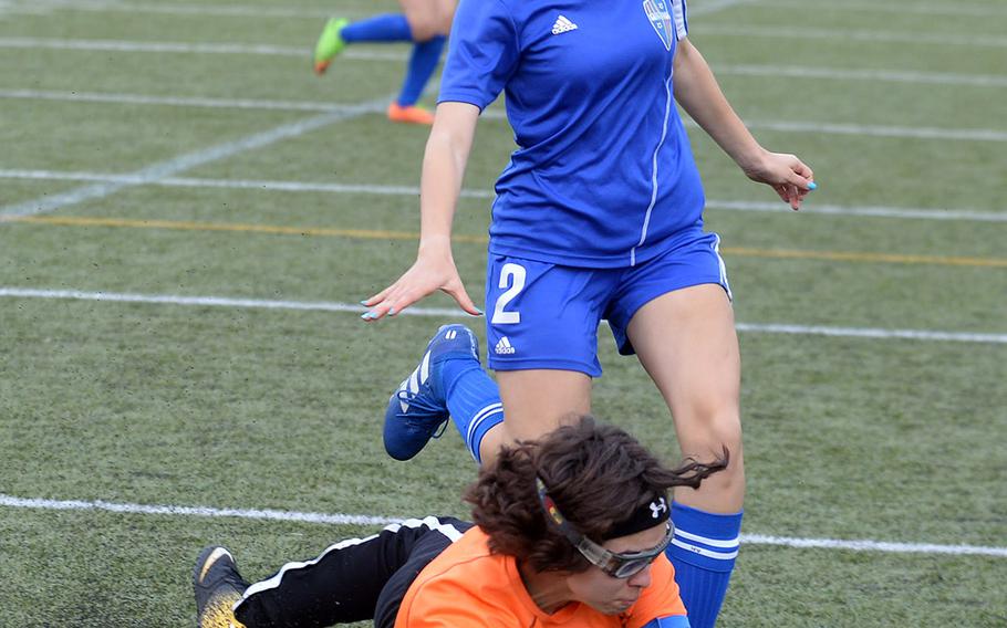 Robert D. Edgren goalkeeper Jasmine Johnston fields the ball in front of Yokota's Hana Vogeley during Friday's DODEA-Japan girls soccer tournament quarterfinal match. The Panthers won 8-0.