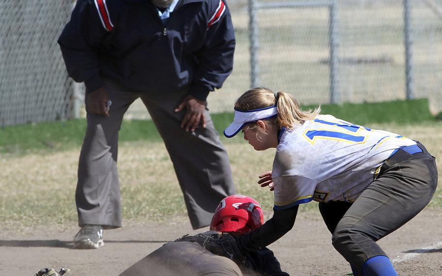 Nile C. Kinnick baserunner Michaela Hall is safe at third under the tag of Yokota's Isabella Garcia during Saturday's DODEA-Japan softball tournament final. The Panthers won 11-9.