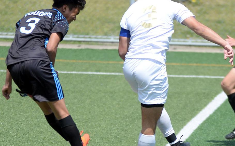 Osan's Lean Copia and Humphreys' Devin Donnell go up to head the ball during the semifinal.