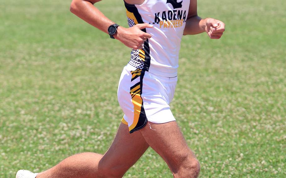 Kadena's Guy Renquist heads toward victory in the 3,200 during Saturday's Okinawa district finals.