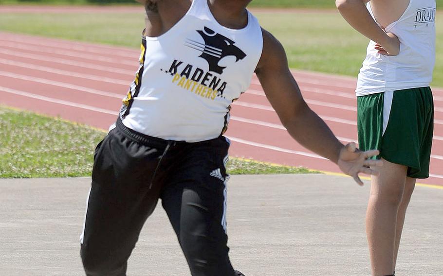 Kadena senior Uriah Morris lets fly with the shot put. He threw a 15.15 on his first attempt, breaking the old district record by 3.03 meters, and what would have surpassed the Far East meet record of 15.11 set three years ago by Seoul American's David Davison.
