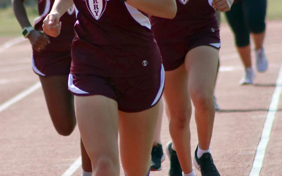 Matthew C. Perry's Hannah Widner leads the pack en route to victory in the 800 during Saturday's Samurai Invitational.