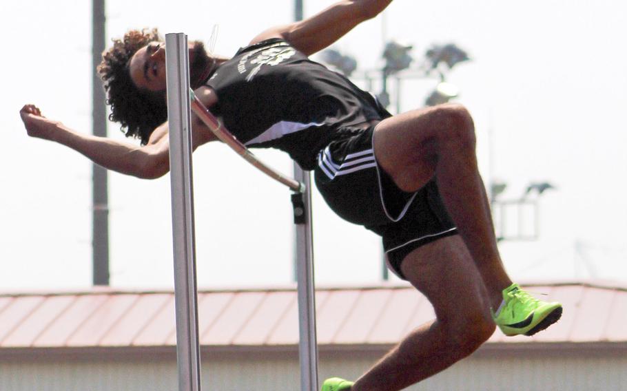 Humphreys' Quintin Metcalf clears the bar at 1.9 meters during Saturday's Korea district track and field finals. He took first place and leads the Pacific in the event this season.