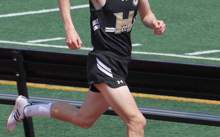 Humphreys' Daniel McIntosh heads down the home stretch during Saturday's Korea district track and field finals. McIntosh, a senior, took the 1,600 and 3,200.