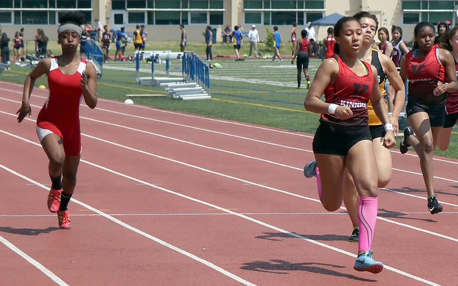 Nile C. Kinnick's Debrianna Ellis leads the pack to the finish in the girls 200 during Saturday's Kanto Plain track and field finals. Ellis finished first in the 100, 200 and 400.