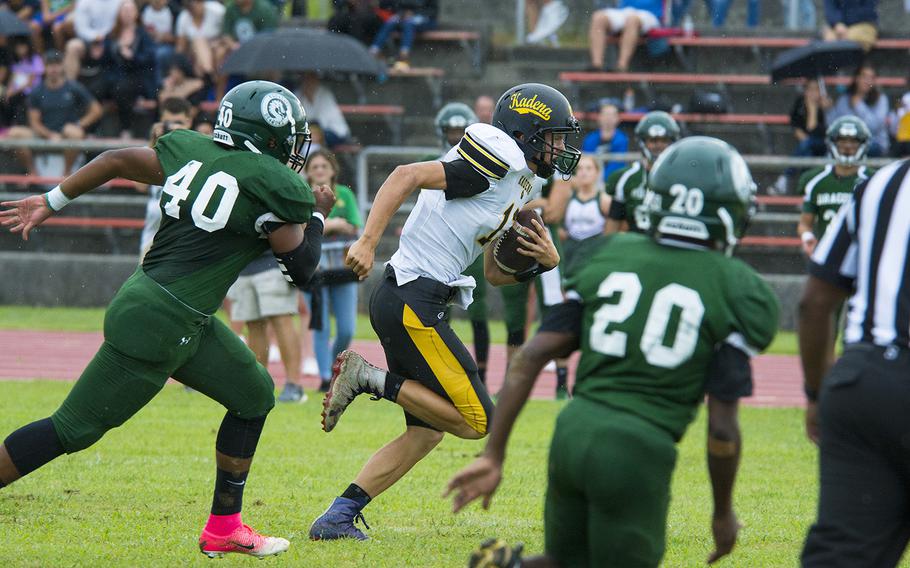 Jack Carey, quarterback for the Kadena Panthers, runs the ball during a game against the Kubasaki Dragons at Mike Petty Stadium on Camp Foster, Okinawa, Japan, Saturday, Sept. 7, 2019. 