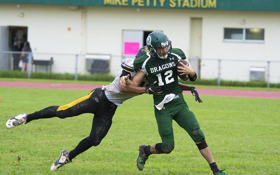 Luke Kappen, a player for the Kubasaki Dragons, runs the ball during a game against the Kadena Panthers at Mike Petty Stadium on Camp Foster, Okinawa, Japan, Saturday, Sept. 7, 2019.