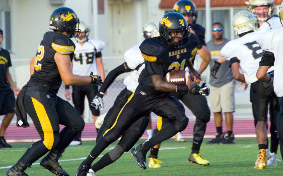 Kadena running back Xavier Peace slices through Humphreys' defense on a reverse carry. It was Peace's last game in Panthers uniform; he transfers this month.