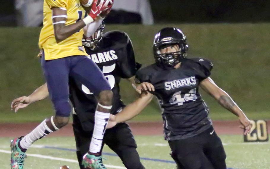 Guam High receiver A.J. Johnson goes up for one of his six catches for 120 yards in what coach Jacob Dowdell called his "breakout" game of the season.