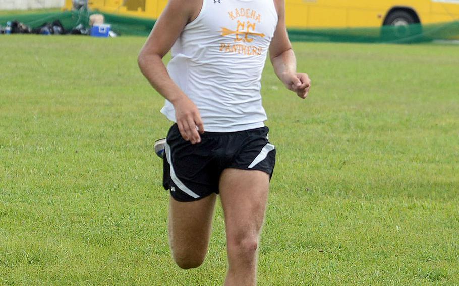 Kadena senior Will Ray crosses the finish line in 17 minutes, 20 seconds in Monday's Okinawa cross country race.