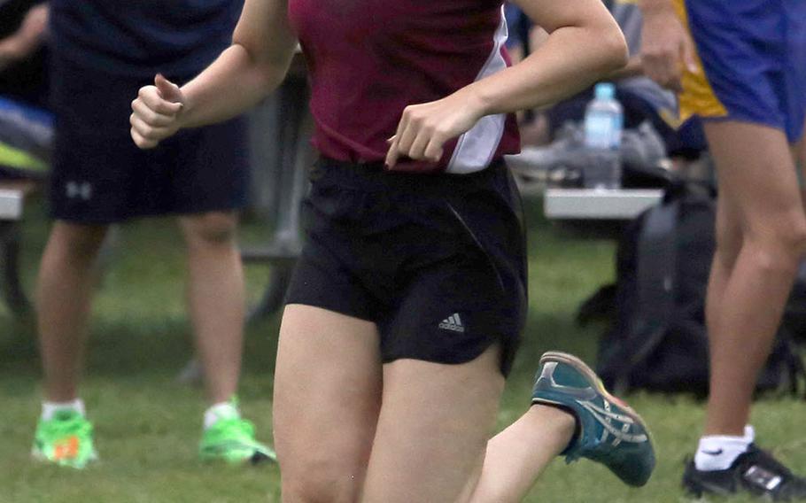 Seisen's Nana Richter approaches the finish line during Thursday's Kanto Plain cross country race at Tama Hills Recreation Center. Richter won the girls race in 20 minutes, 46.3 seconds.