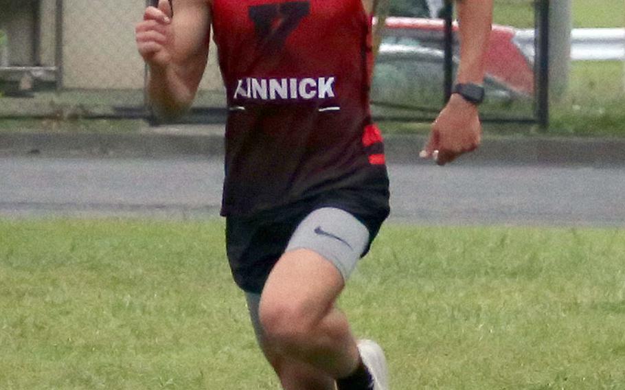 Nile C. Kinnick's Hanokheliyahu Gailson approaches the finish line during Thursday's Kanto Plain cross country race at Tama Hills Recreation Center. Gailson won in 17 minutes, 14.9 seconds.