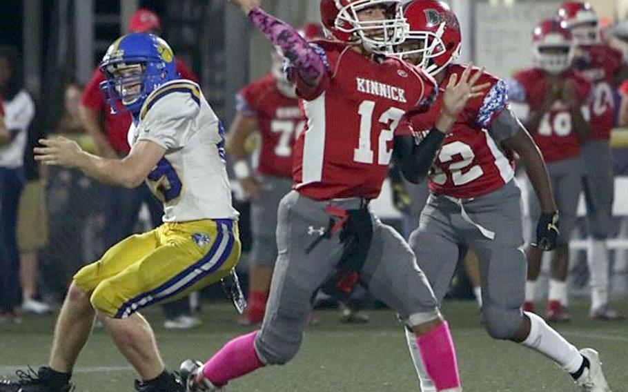 Nile C. Kinnick quarterback Patrick Kelly accounted for 220 yards total offense and three touchdowns.