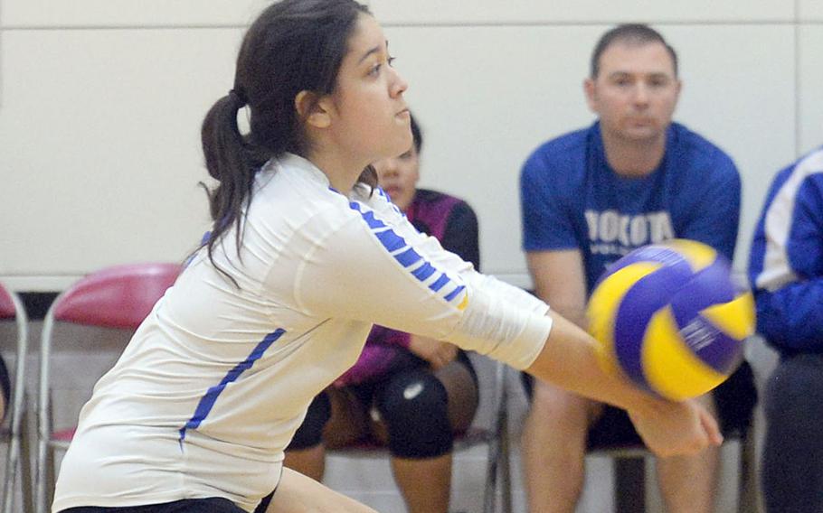 Yokota libero Veronica Crawford digs up the ball against Christian Academy Japan during Thursday's pool-play match in the 5th American School In Japan YUJO Volleyball Tournament. The Panthers won in three sets.