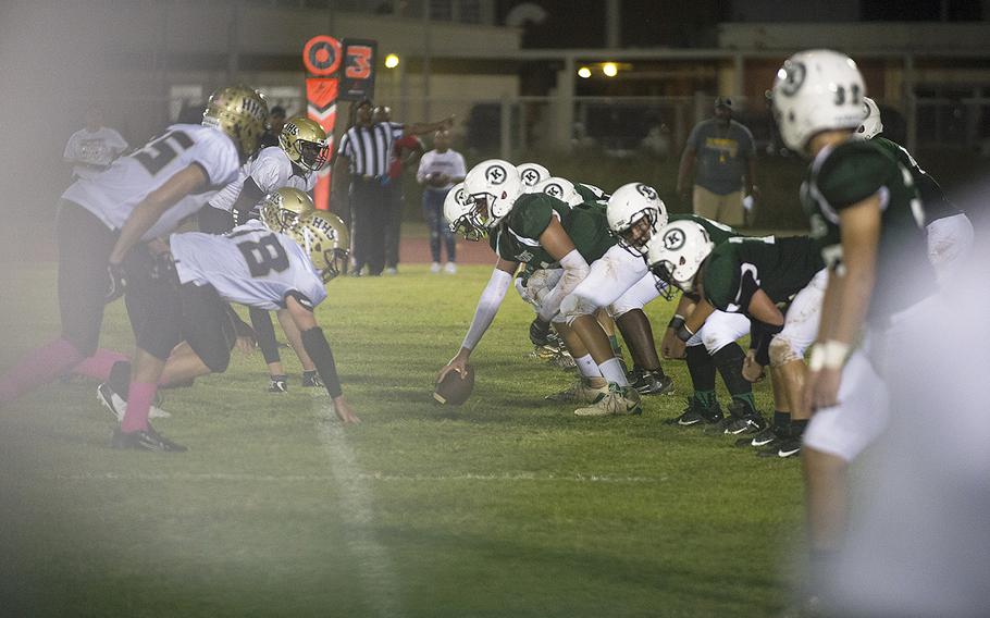 The Kubasaki Dragons prepare to hike the ball against the Humphreys Blackhawks at Mike Petty Stadium on Camp Foster, Okinawa, Japan, Friday, Oct. 25, 2019. 