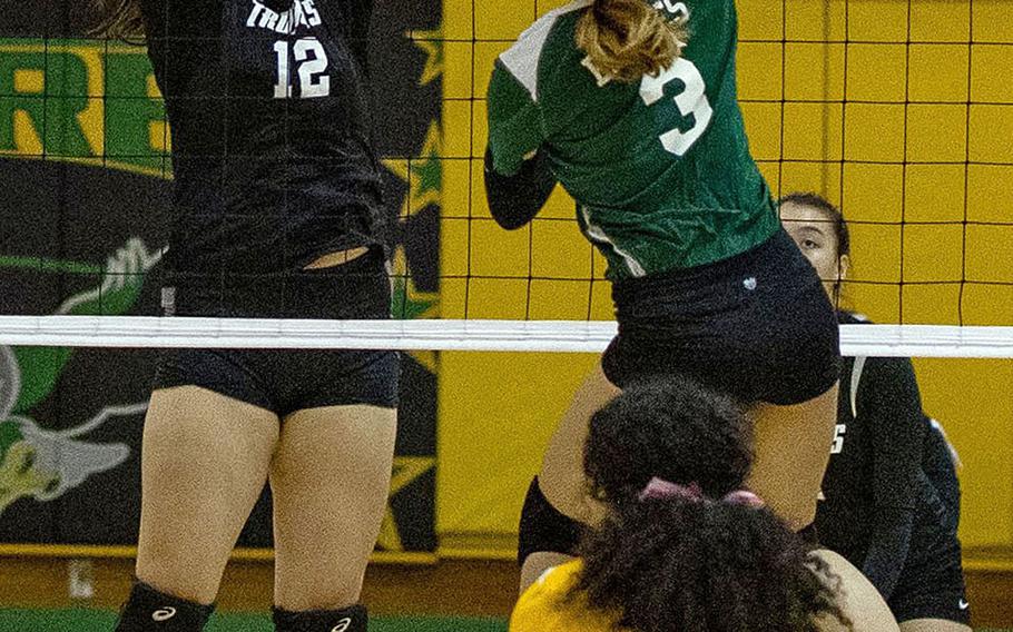 Robert D. Edgren's Emily Ichijo goes up to hit against Zama's Jessica Atkinson during Friday's DODEA-Japan girls volleyball match, won by the Eagles in four sets.