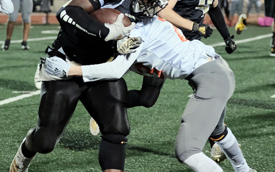 Humphreys running back David Key carries against the Nile C. Kinnick defense.
