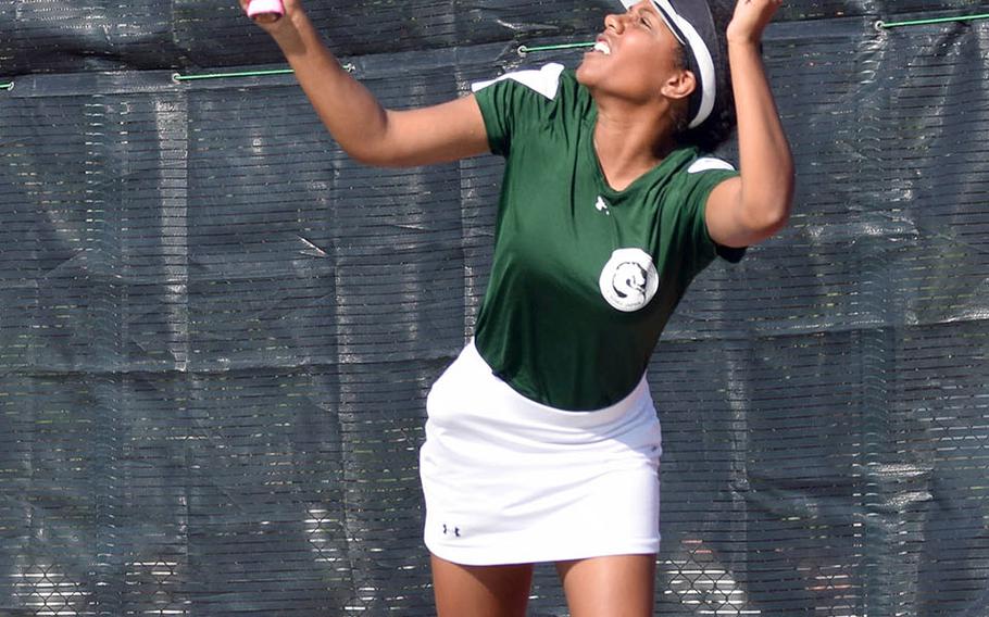 Kubasaki's Chante Broomes smacks an overhand return during Wednesday's Far East tennis tournament girls singles action. Broomes beat Matthew C. Perry's Olivia Archambault 8-1 in the first round, then lost 8-5 to Nile C. Kinnick's Aleigh Lamis in the second round.